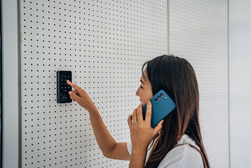 Woman with badge card near office door