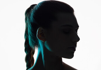 Woman face, beauty and silhouette with shadow in studio for creativity, dark art deco and white...