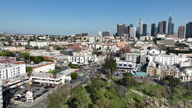 Los Angeles Downtown and Palm Trees from MacArthur Park Aerial Shot Back R in California USA
