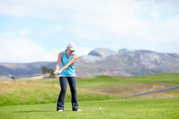 Swing, woman or golfer playing golf for fitness, workout or exercise with a driver on a green...