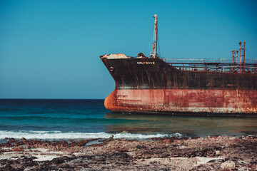 Abandoned shipwreck on the sandy shores of Delisha Beach, Socotra, Yemen