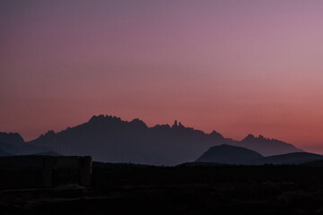 Colorful twilight over jagged mountains near Delisha Beach, Socotra Island.
