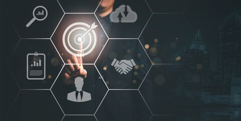 Take the buyer persona concept of customer behavior. Marketing plans and personal marketing strategies Customer-centric strategy Businessman touching screen with target customer