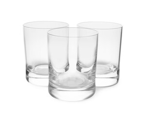 Elegant clean empty shot glasses isolated on white