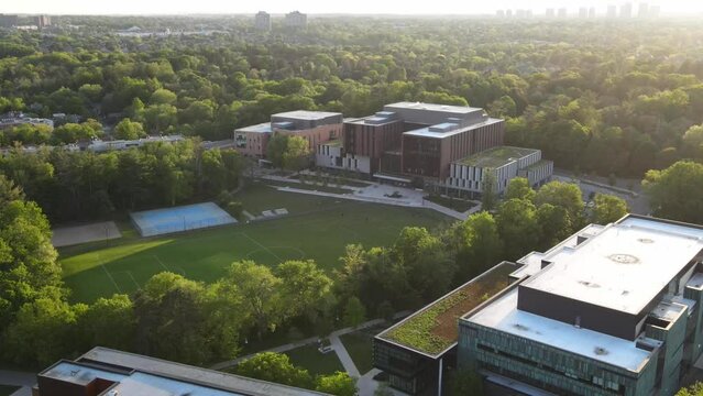 Aerial drone shot of university campus building in Mississauga, Canada. Top-down view of Modern architecture educational building of campus and library in sunlight summer