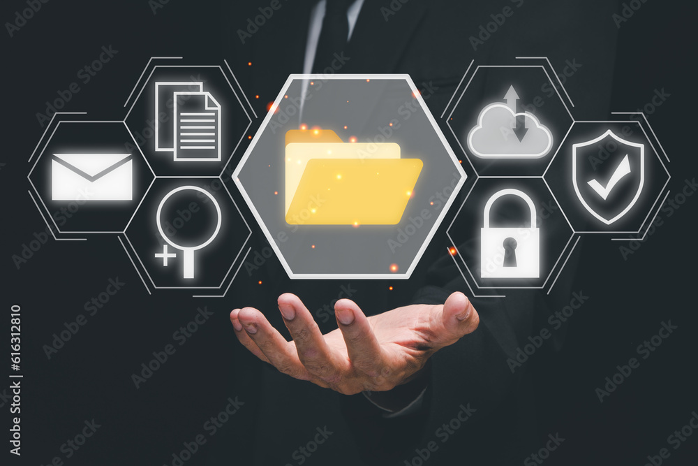 Poster document management system (dms), businessman hand holding folder and document icon on virtual scree