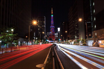 Fototapeta na wymiar 7色のインフィニティダイヤモンドベールにライトアップされた東京タワーと港区三田の夜景