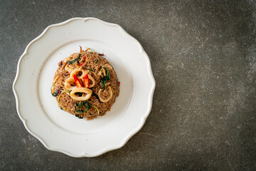 fried rice with squid and basil in Thai style