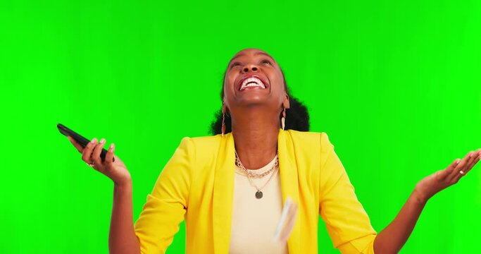 Phone, money rain and woman on green screen, wow and winning in lottery, online gambling or competition. Cash in air, financial freedom and african person success, yes and mobile on studio background
