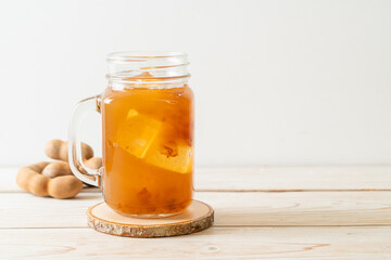 Delicious sweet drink tamarind juice and ice cube