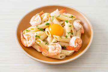 penne pasta white cream sauce with shrimps and egg