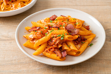 stir-fried penne pasta with kimchi and bacon