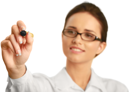 Professionally dressed female writing with a dry erase marker
