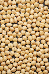 Whole shelled hazelnuts nuts kernels close-up studio background