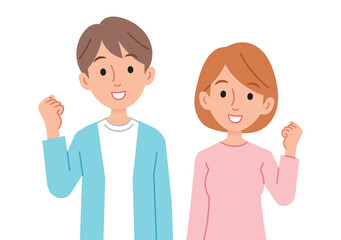 ガッツポーズをする男女