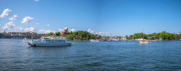 The inner harbor passenger ferry Sjövägen, sailing and cruise boats in the bay...