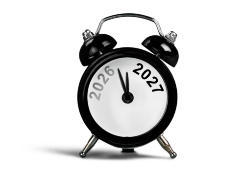 Black alarm clock on with number year. New year concept.