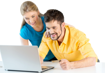 Young cute couple working together with laptop