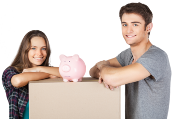Couple moving into new house with box and piggy bank