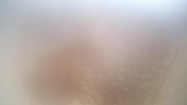 A video shows the process of boiling crude soap in a factory boiling chamber