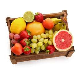Wooden box with different fresh fruits on white background