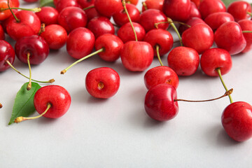 Many sweet cherries on white background