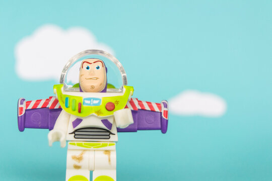 March 14, 2017, Seville, Spain: Buzz Lightyear construction figure on blue sky and white cloud background