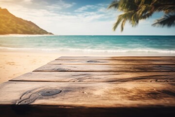 Fototapeta premium Wooden table photo booth on a tropical beach by the sea for advertising products.
