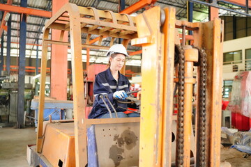 Fototapeta na wymiar Industrial Engineer at work in factory, industrial engineers working at automated AI robotic production factory - New technology concept