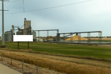 grain elevator in the country and billboard with copy space 
