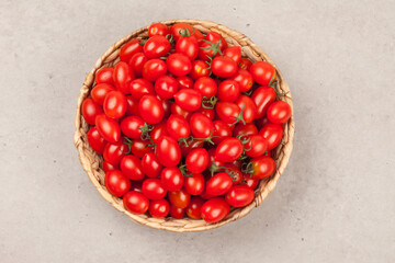 
A bell-shaped tomato that is much smaller than a normal tomato.