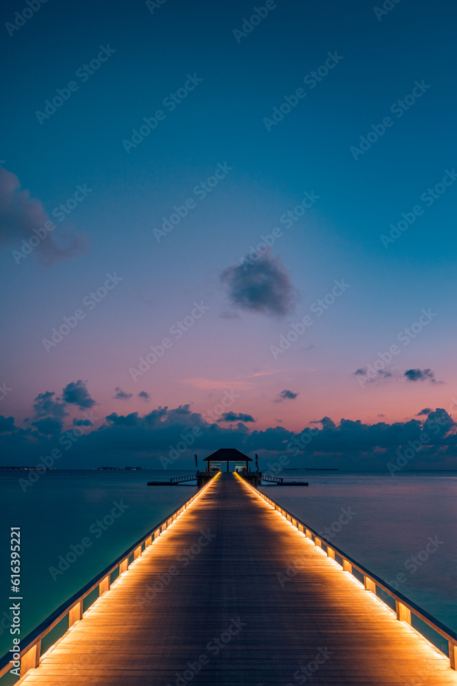 Wall mural amazing sunset panoramic beach maldives. luxury resort villas long wooden pier seascape with soft le - Wall murals