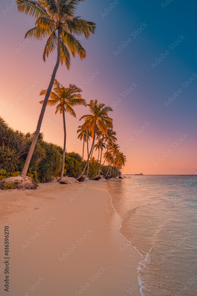 Wall mural palm trees on sandy island close to ocean. beautiful bright sunset on tropical paradise beach, relax - Wall murals