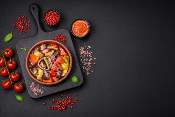 Delicious fresh vegetarian salad with tomatoes, green beans, eggplant and pepper