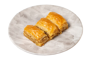 Walnut baklava isolated on white background. Turkish cuisine delicacies. Turkish baklava. close up