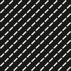 Dash line pattern. Vector monochrome seamless texture with diagonal parallel lines, stripes. Abstract black and white background. Simple monochrome ornament. Perforated surface. Dark repeat geo design