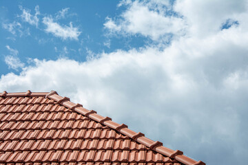 new red tiles roof and blue sky