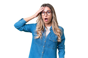 Young Uruguayan woman over isolated background has realized something and intending the solution