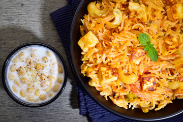 Pulao served with raita top view, healthy indian food