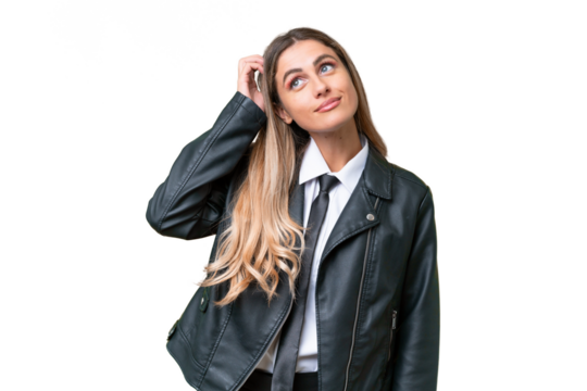 Business pretty Uruguayan woman wearing a biker jacket over isolated background thinking an idea