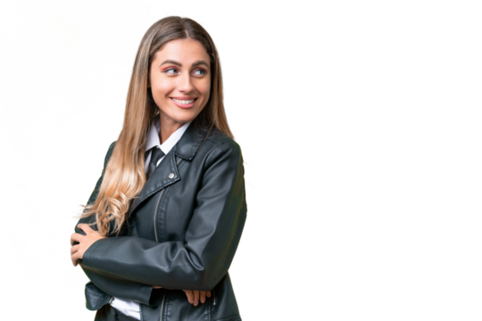 Business pretty Uruguayan woman wearing a biker jacket over isolated background with arms crossed and happy