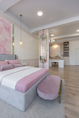modern cozy soft interior design of a room with a bedroom and a home office in warm delicate pastel pink and beige colors