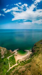 Keuken foto achterwand Bolata strand, Balgarevo, Bulgarije Bolata Beach, Cape Kaliakra, on the northern coast of Bulgaria. The high steep banks of a reddish hue are in harmony with the greenery of grass and the endless blue sea. View from drone.