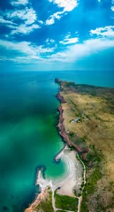 Fototapete Bolata Strand, Balgarevo, Bulgarien Bolata Beach, Cape Kaliakra, on the northern coast of Bulgaria. The high steep banks of a reddish hue are in harmony with the greenery of grass and the endless blue sea. View from drone.