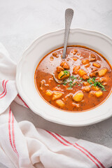 Hungarian hot goulash soup, beef, tomato, pepper, chili, smoked paprika soup