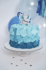 One year old smashing cake boy, only cake. Blue cake for one year old with elephant sugar.