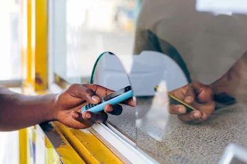Fotobehang Afrika Cashless Transaction, Send and Receive Mobile Money  © Roger