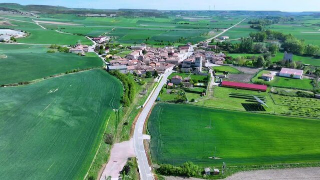 Spring landscape around the Ntra.Sra de Cuesta Castillo Hermitage in Hu&eacute;rmeces. Aerial view from a drone. World geological heritage UNESCO. Las Loras Geopark. Burgos. Castile and Leon. Spain. Europe