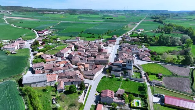 Spring landscape around the Ntra.Sra de Cuesta Castillo Hermitage in Hu&eacute;rmeces. Aerial view from a drone. World geological heritage UNESCO. Las Loras Geopark. Burgos. Castile and Leon. Spain. Europe