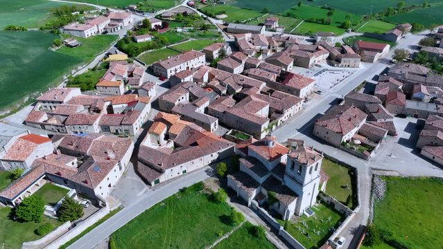 Spring landscape around the Ntra.Sra de Cuesta Castillo Hermitage in Hu&eacute;rmeces. Aerial view from a drone. World geological heritage UNESCO. Las Loras Geopark. Burgos. Castile and Leon. Spain. Europe